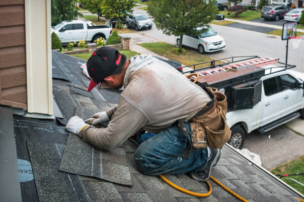 Professional Storm Damage Roof Repair technician working in Westerlo, NY